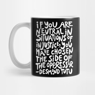 if you are neutral in situations of injustice you have chosen the side of the oppressor (activist quote in groovy white) Mug